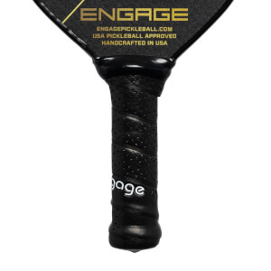 Close-up of a black pickleball paddle grip with perforated texture and Engage text.