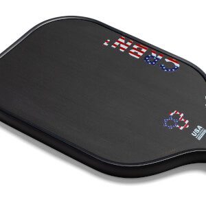 Corner view of a black pickleball paddle with American flag accents and CRBN text.