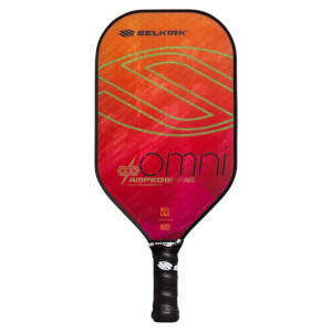 Front view of a red and orange pickleball paddle with green lines, OMNI AMPED text, and a black grip.