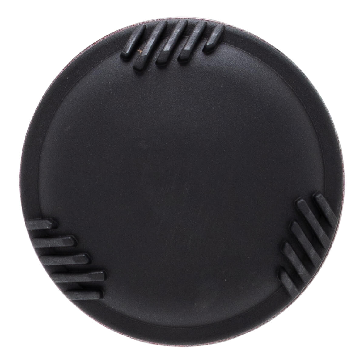 Top-down view of the circular black plastic end cap featuring three sets of raised parallel ridges spaced around its perimeter.