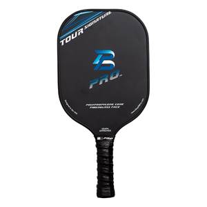Front view of a black pickleball paddle with blue TOUR SIGNATURE text, a blue B PRO logo, and USAPA APPROVED text.