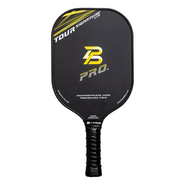 Front view of a black pickleball paddle with yellow TOUR SIGNATURE LITE text, a yellow B PRO. logo, and POLYPROPYLENE CORE FIBERGLASS FACE text.