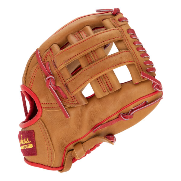 Angled view of a tan baseball glove with red lacing, a basket web, and a Shoeless Joe logo on the wrist.