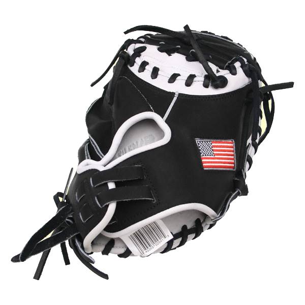 Side view of a black catchers mitt with white lacing, an American flag patch, and a barcode tag.