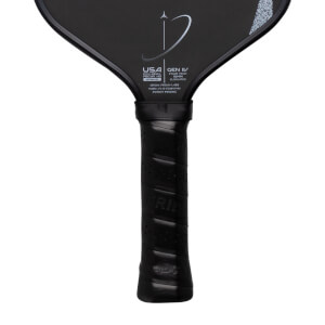 Close-up of a black pickleball paddles textured grip with FRIDAY branding and lower paddle face showing USA GEN IV text.
