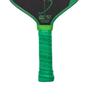 Close-up of a bright green pickleball paddle grip with repeated FRIDAY text, perforated texture, and black paddle face.
