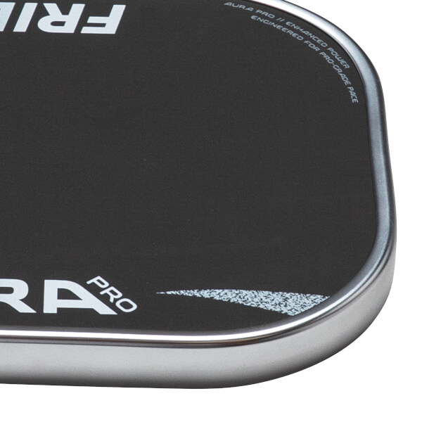 Corner view of a black product with white text "PRO" and a silver metallic edge.