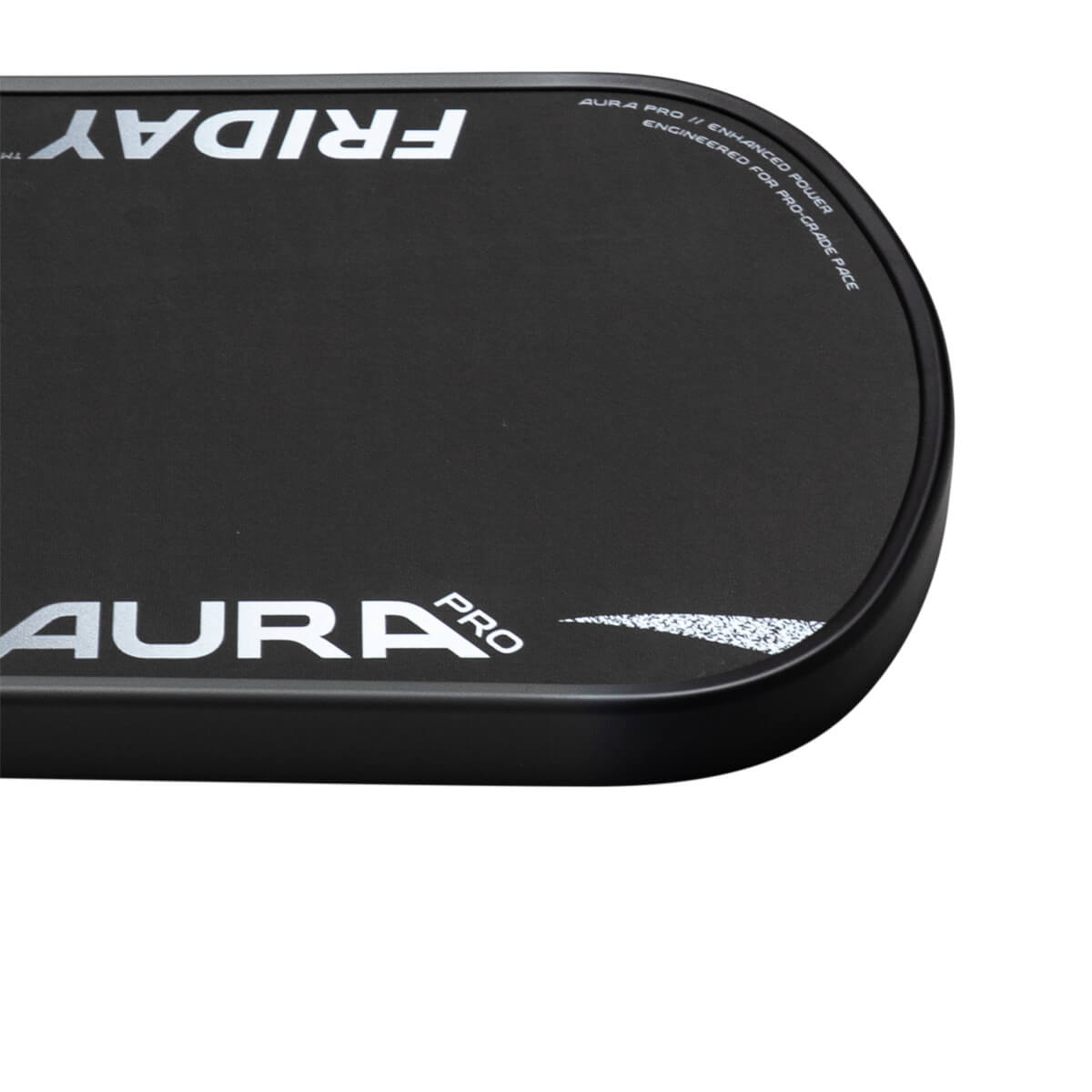 Corner view of a black 'FRIDAY' pickleball paddle with 'AURA PRO' and 'ENGINEERED FOR PRO-GRADE FACE' text.