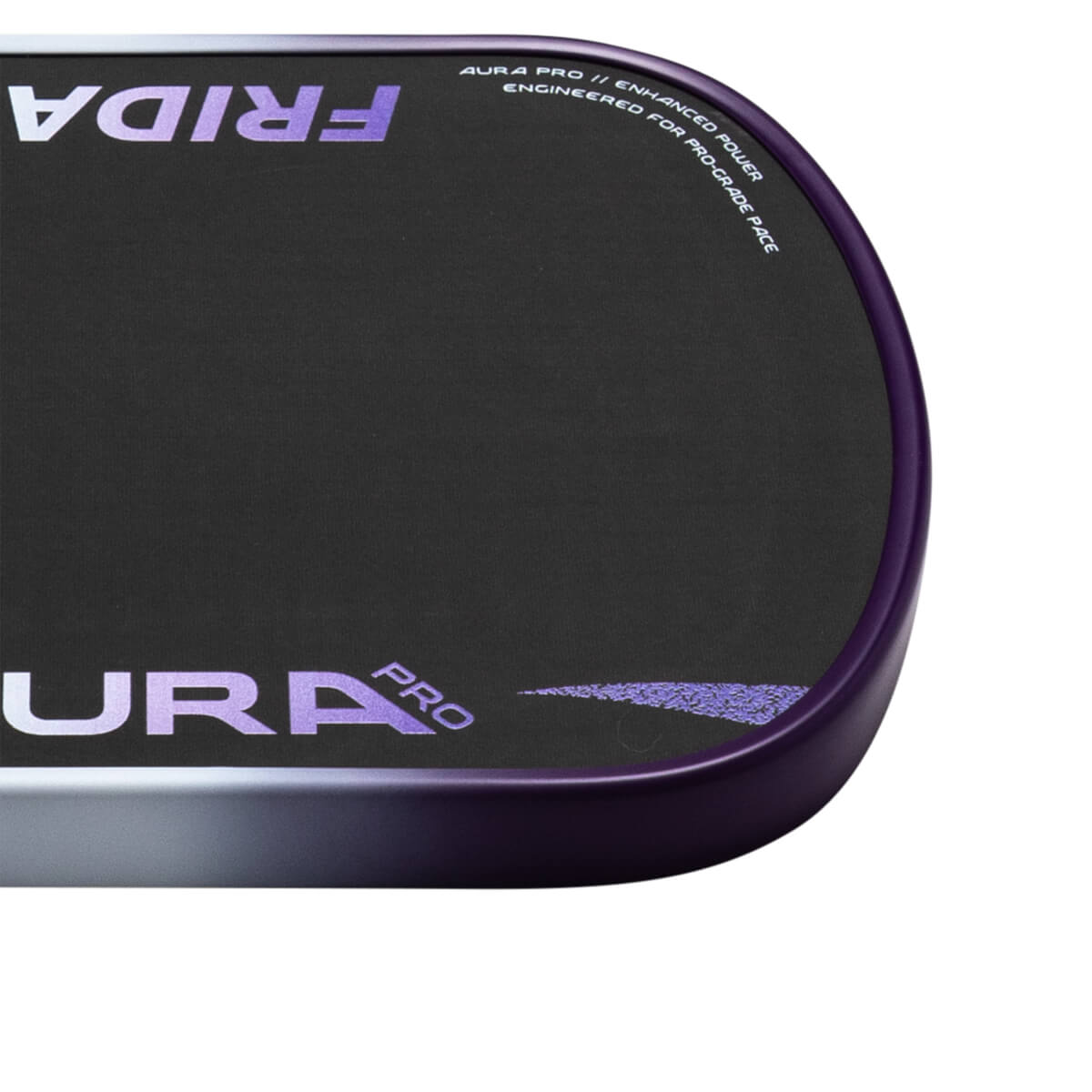 Corner view of a black pickleball paddle with purple "FRIDA" and "AURA PRO" logos, and text "AURA PRO // ENHANCED POWER".