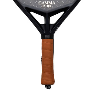 Close-up of a black GAMMA PADEL racket head with a brown grip and black end cap.