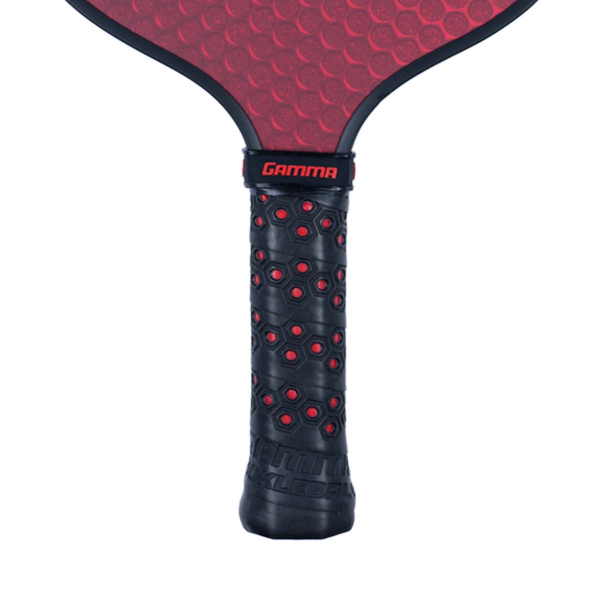 Close-up of a black pickleball paddle grip with red hexagonal pattern and GAMMA logo.