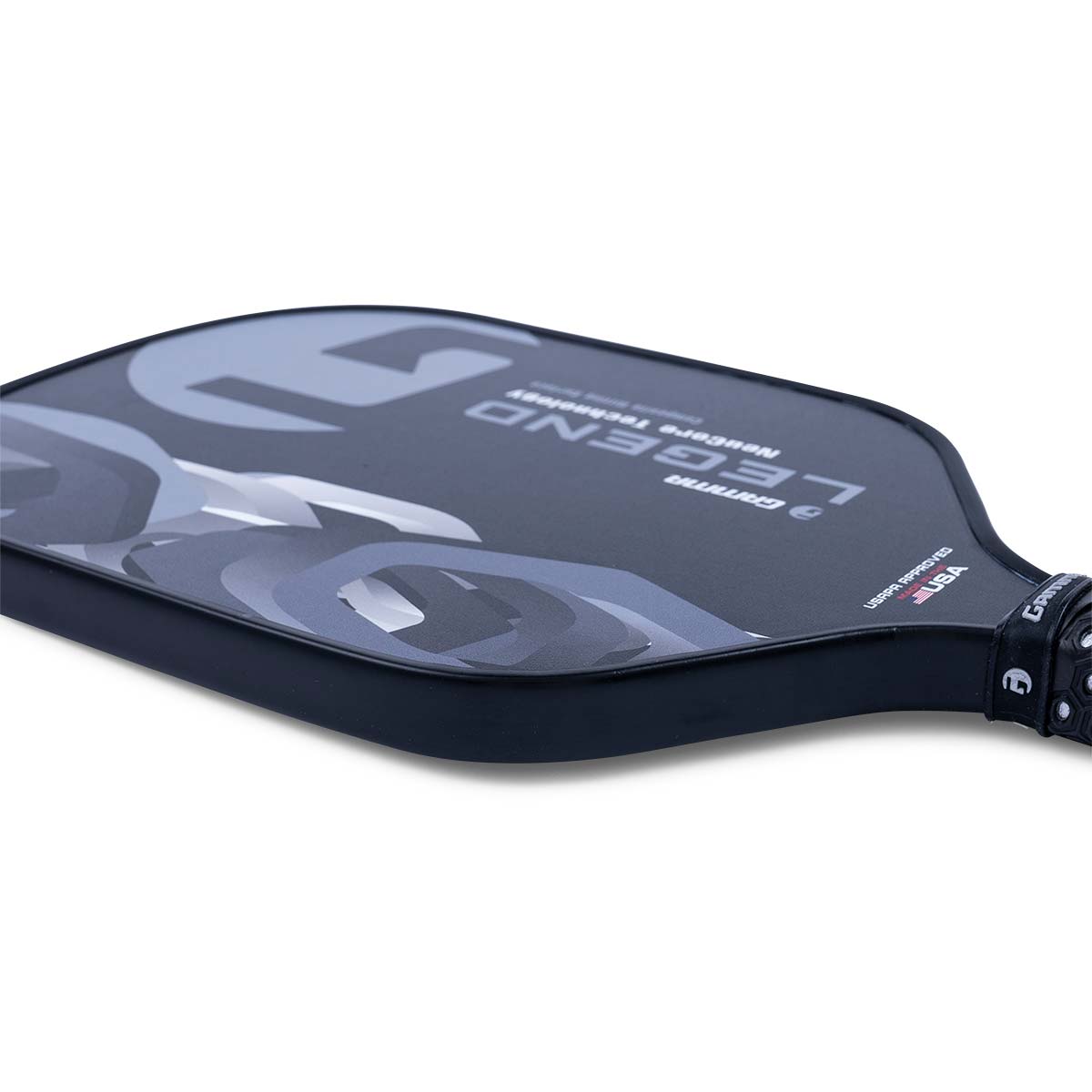 Side view of a black pickleball paddle with LEGEND text and a grey camouflage pattern.