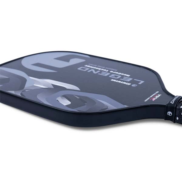 Side view of a black pickleball paddle with LEGEND text and a grey camouflage pattern.