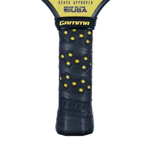 Close-up of a black pickleball paddle grip with yellow hexagonal pattern and GAMMA logo.