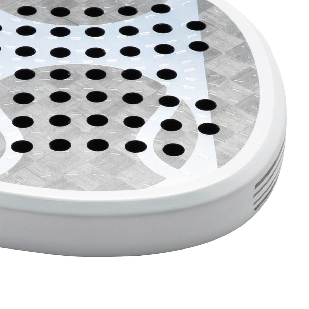 Corner view of a white paddle with a grey textured surface and black circular holes.