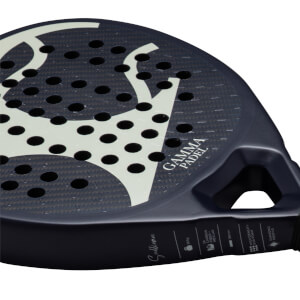 Side view of a black padel racket with a white "GAMMA PADEL" logo and a carbon fiber texture.