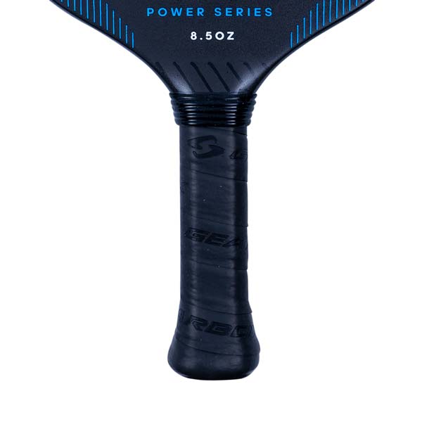 Close-up of a black pickleball paddle grip with GEARBOX text and POWER SERIES 8.5OZ on the paddle head.