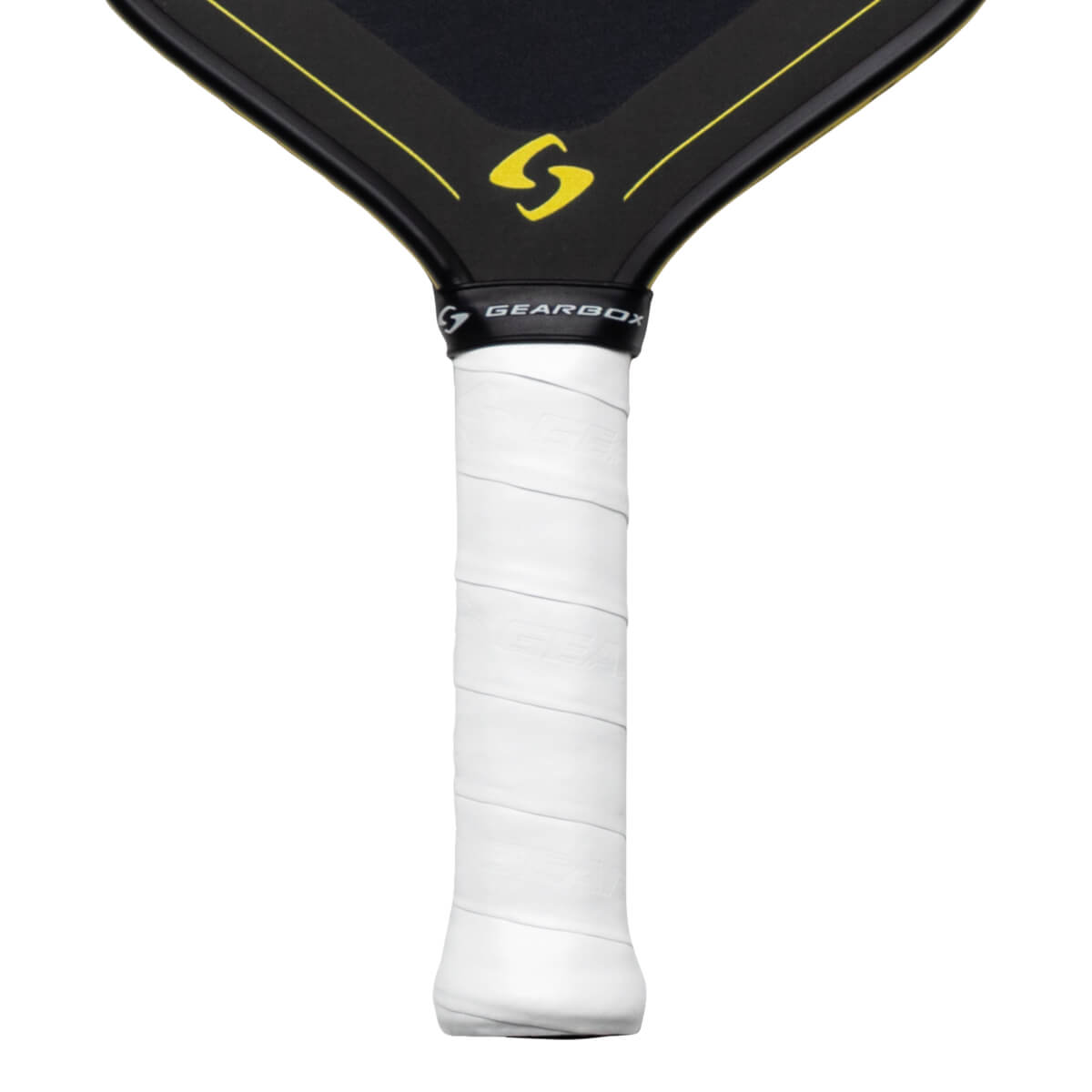 Close-up of a pickleball paddle handle showing white grip tape with embossed "GEARBOX" text and the black neck with yellow accents and a yellow "S" logo.