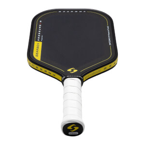 Top-down view of a black pickleball paddle with yellow trim, showing "GEARBOX PRESSURE" and a yellow "S" logo.