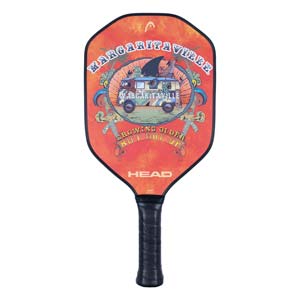 Front view of an orange pickleball paddle with a Margaritaville van graphic and GROWING OLDER BUT NOT UP text.