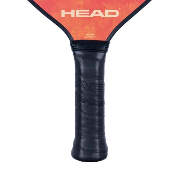 Top-down view of an orange pickleball paddle with a black grip and HEAD logo.