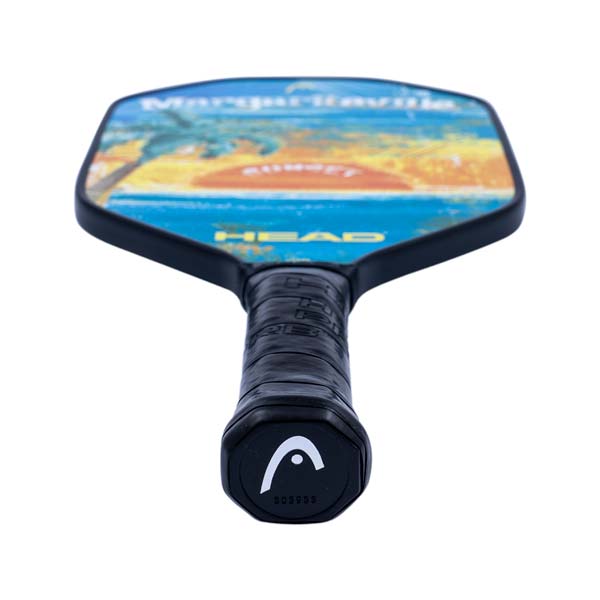 Top-down view of a black pickleball paddle with a sunset graphic, HEAD text, and a black grip.