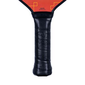 Close-up of a black pickleball paddle grip with HEAD PROS text and USAPA APPROVED stamp.