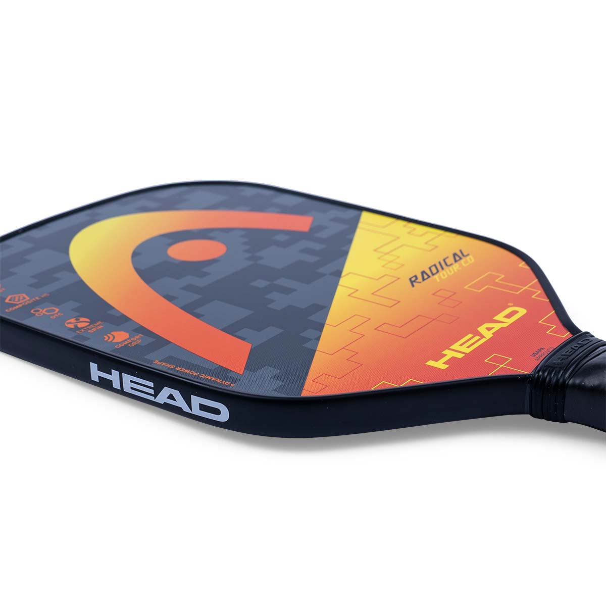 Side view of a black pickleball paddle with a large orange HEAD logo and RADICAL TOUR CO text.