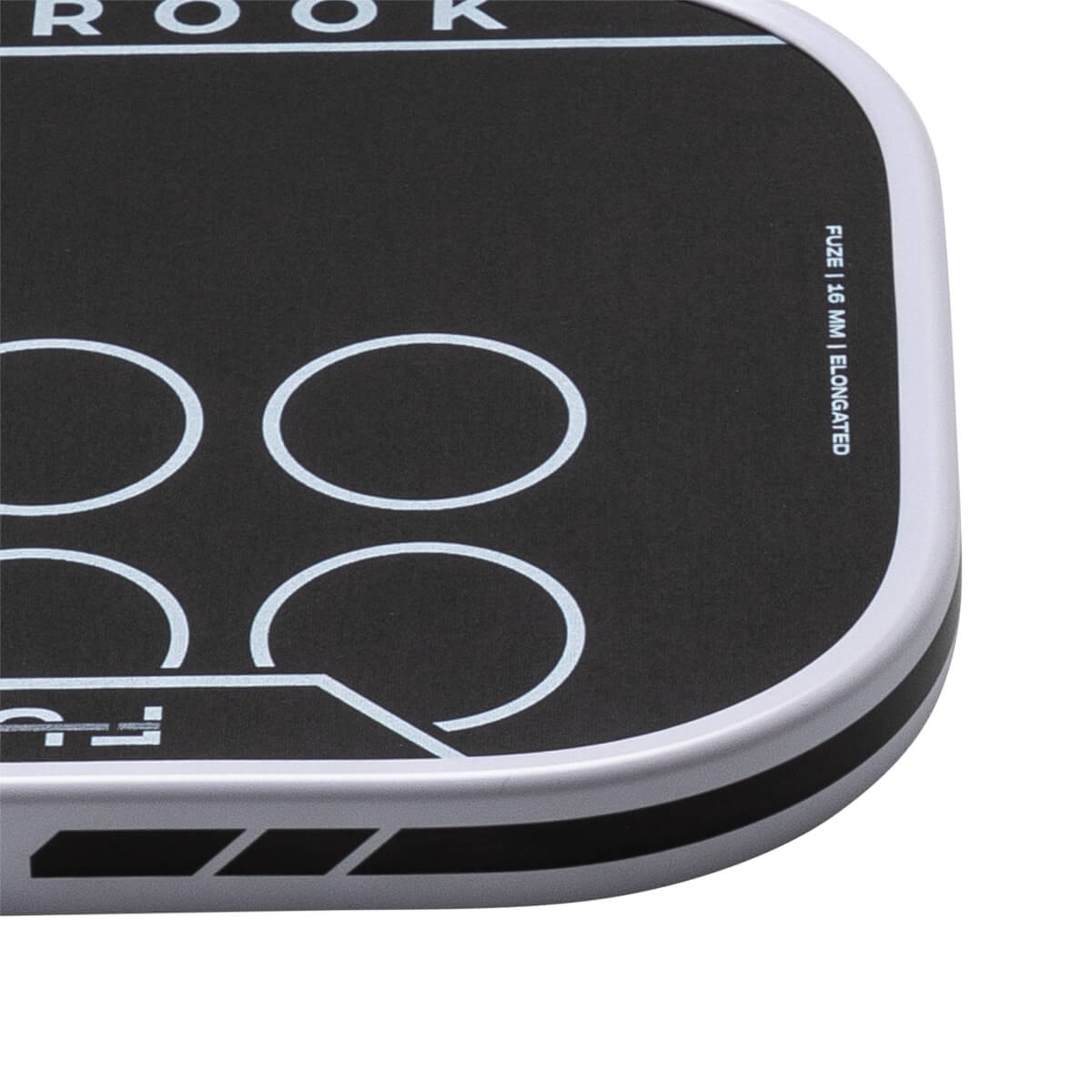 Corner view of a black product with white circles and text that reads "FUZE | 16 MM | ELONGATED".