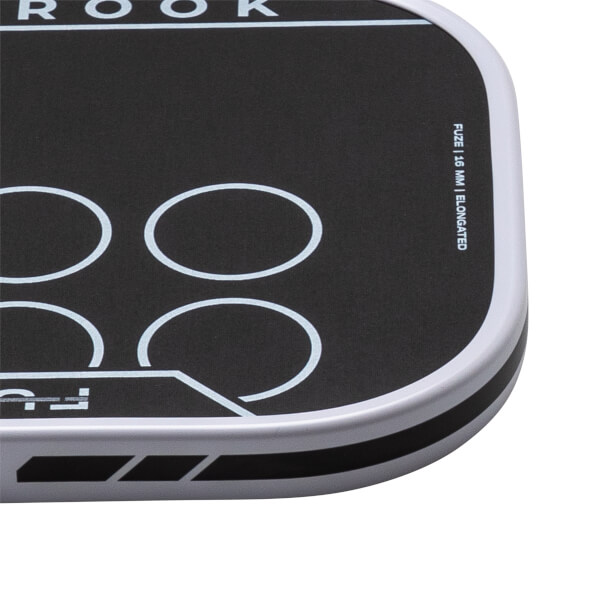 Corner view of a black product with white circles and text that reads "FUZE | 16 MM | ELONGATED".