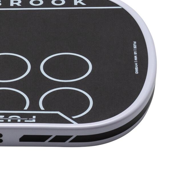 Corner view of a black and white product with "BROOK" and "FUZE | 16 MM | HYBRID" text.