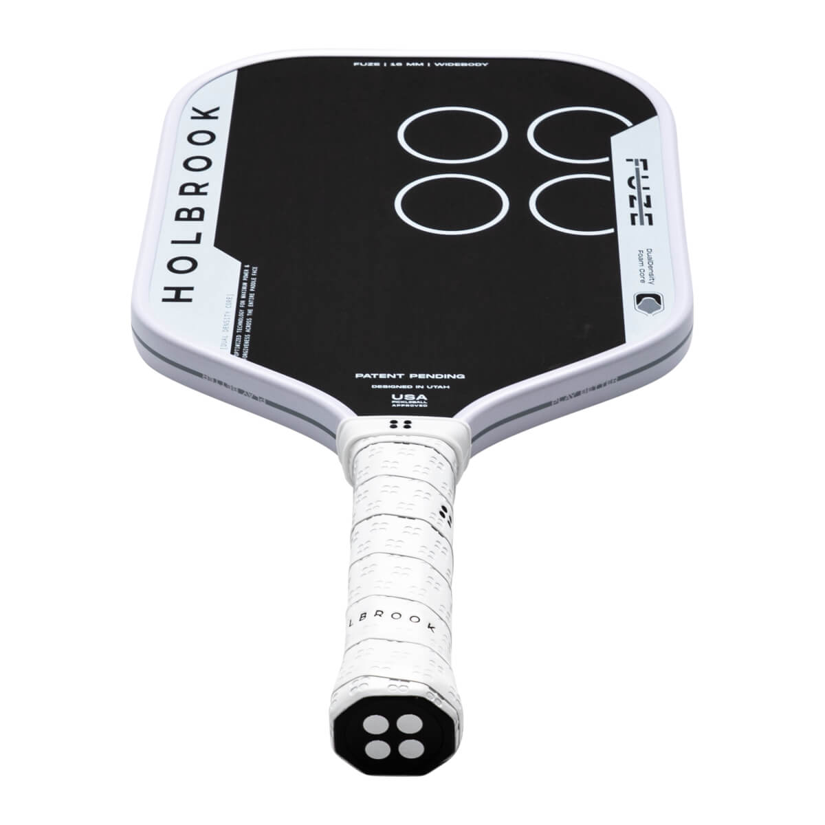 Top-down view of a white pickleball paddle with black face, "HOLBROOK" text, and four white circles.