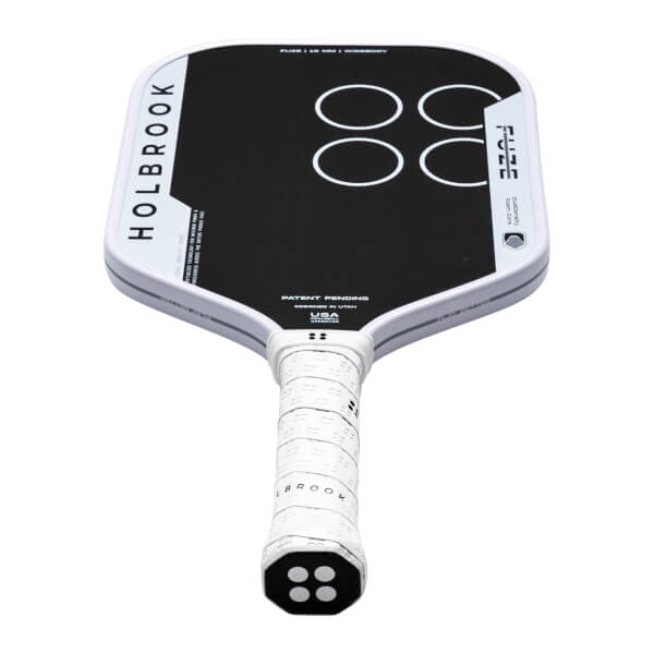 Top-down view of a white pickleball paddle with black face, "HOLBROOK" text, and four white circles.