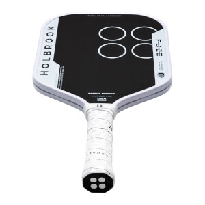 Top-down view of a white pickleball paddle with black face, "HOLBROOK" text, and four white circles.