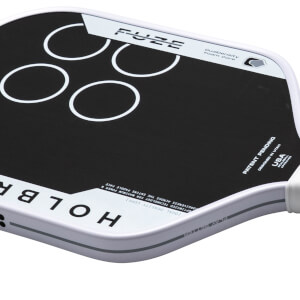 Top-down view of a black pickleball paddle with white circles and the word "FUZE" printed on it.