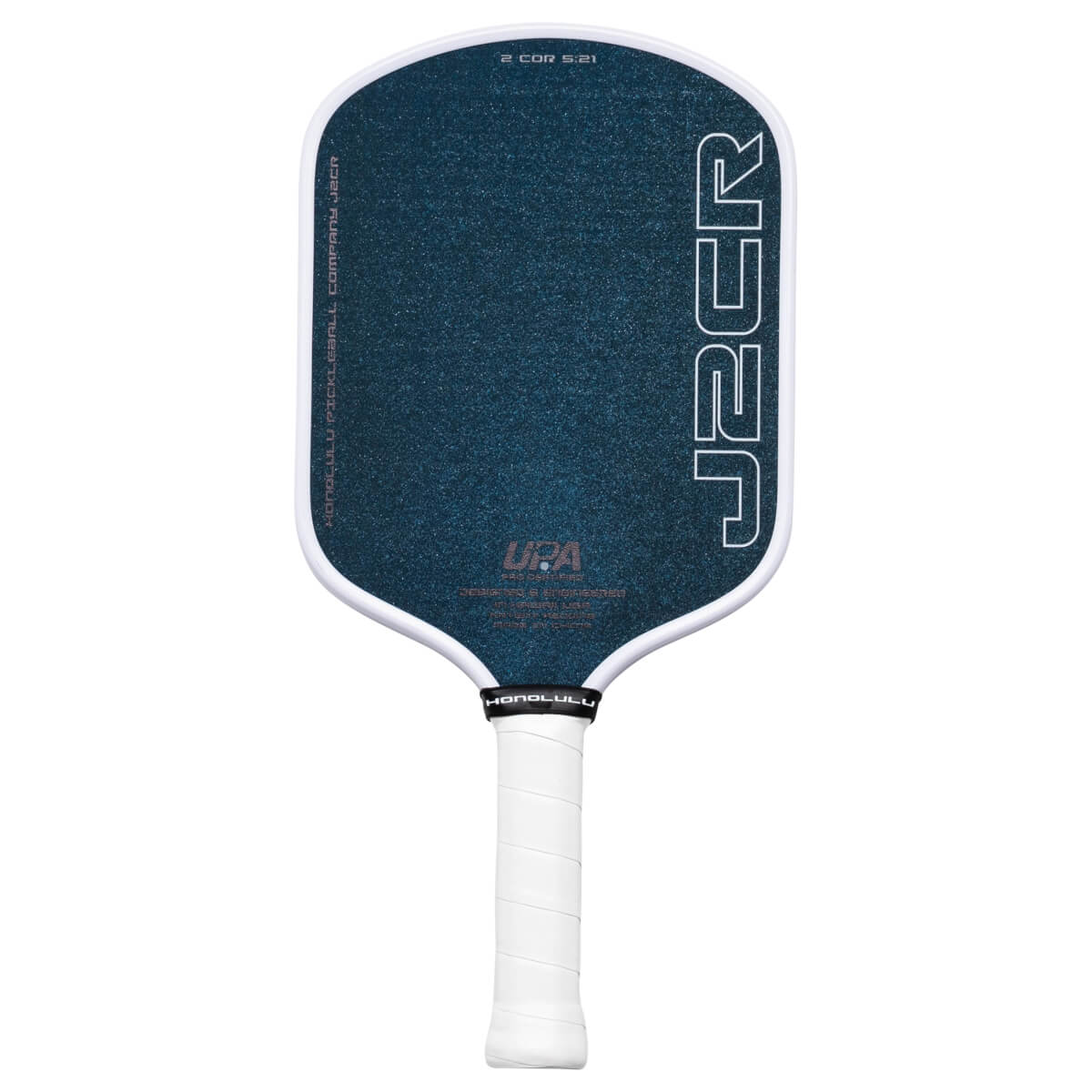 Front view of a dark blue pickleball paddle with white trim, featuring the "J2CR" logo and "2 COR 5:21" text.