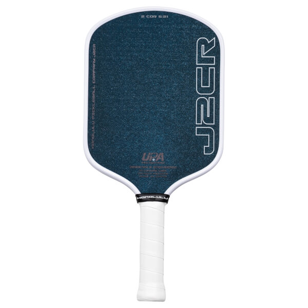 Front view of a dark blue pickleball paddle with white trim, featuring the "J2CR" logo and "2 COR 5:21" text.