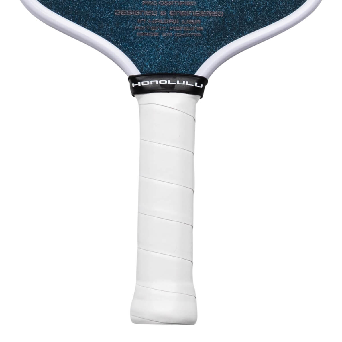 Close-up of the handle showing the white grip and the black band with "HONOLULU" text.