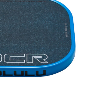 Corner view of a blue paddle with a textured dark blue surface and white text reading "BER" and "LULU".