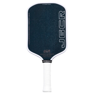 Front view of a dark blue pickleball paddle with white trim, featuring "JBCR" and "HONOLULU" text.