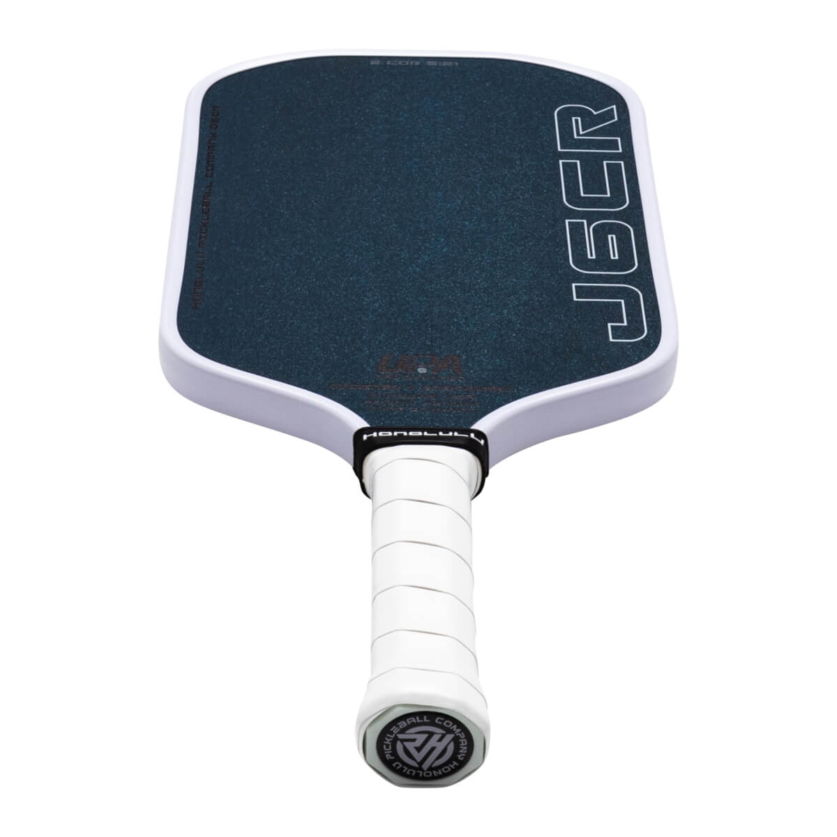 Top-down view of a pickleball paddle with a dark textured surface, white trim, and "JGCR" in white outline.
