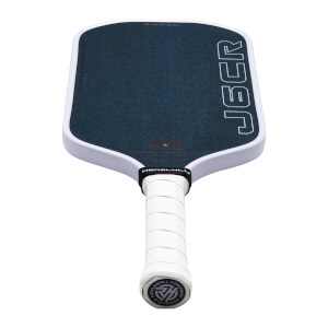 Top-down view of a pickleball paddle with a dark textured surface, white trim, and "JGCR" in white outline.