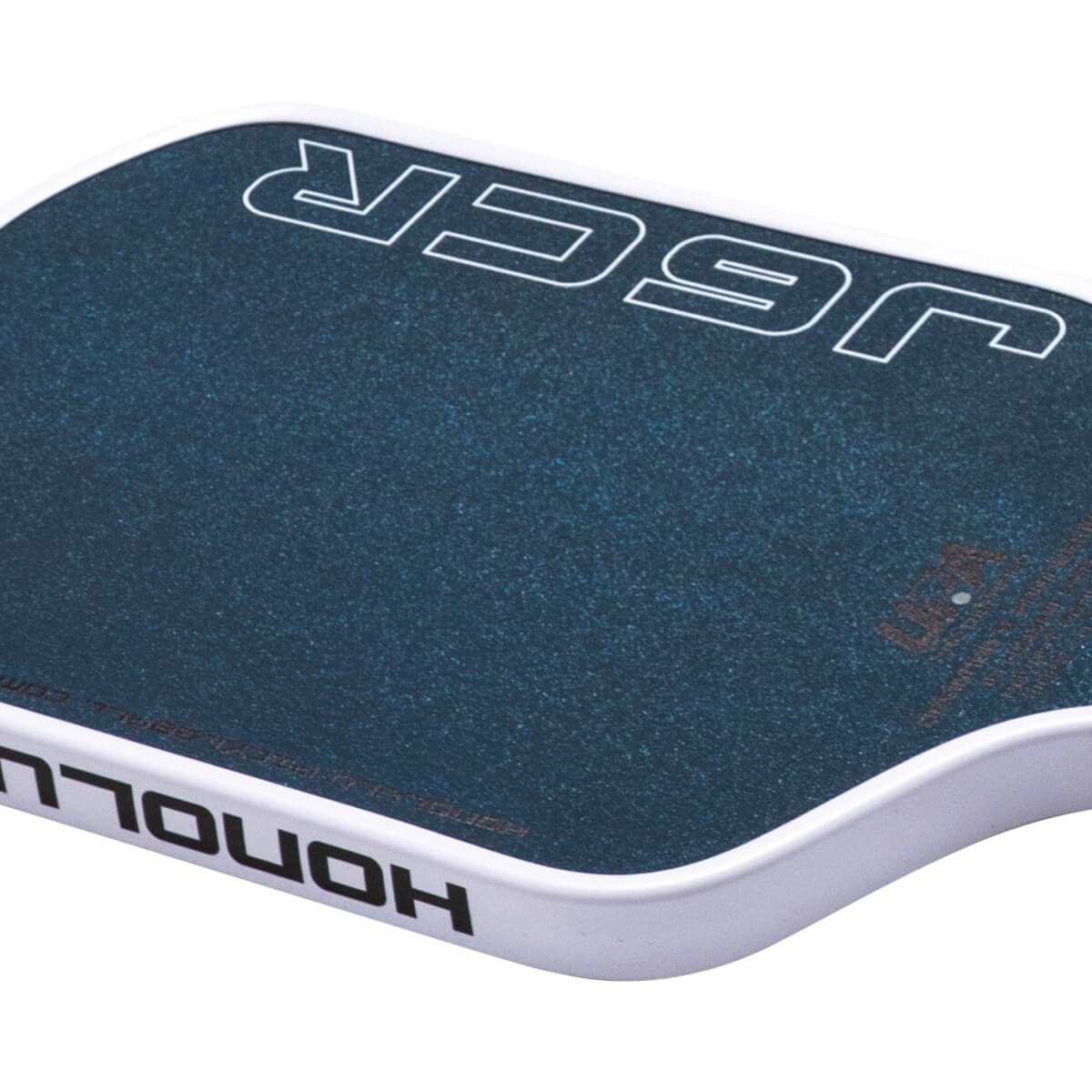 Top-down view of a dark blue textured grip with white "JESCR" lettering and "HONOLULU" on the edge.