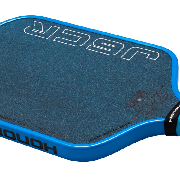 Top-down view of a blue pickleball paddle with a textured dark blue surface and white "JSECR" lettering.