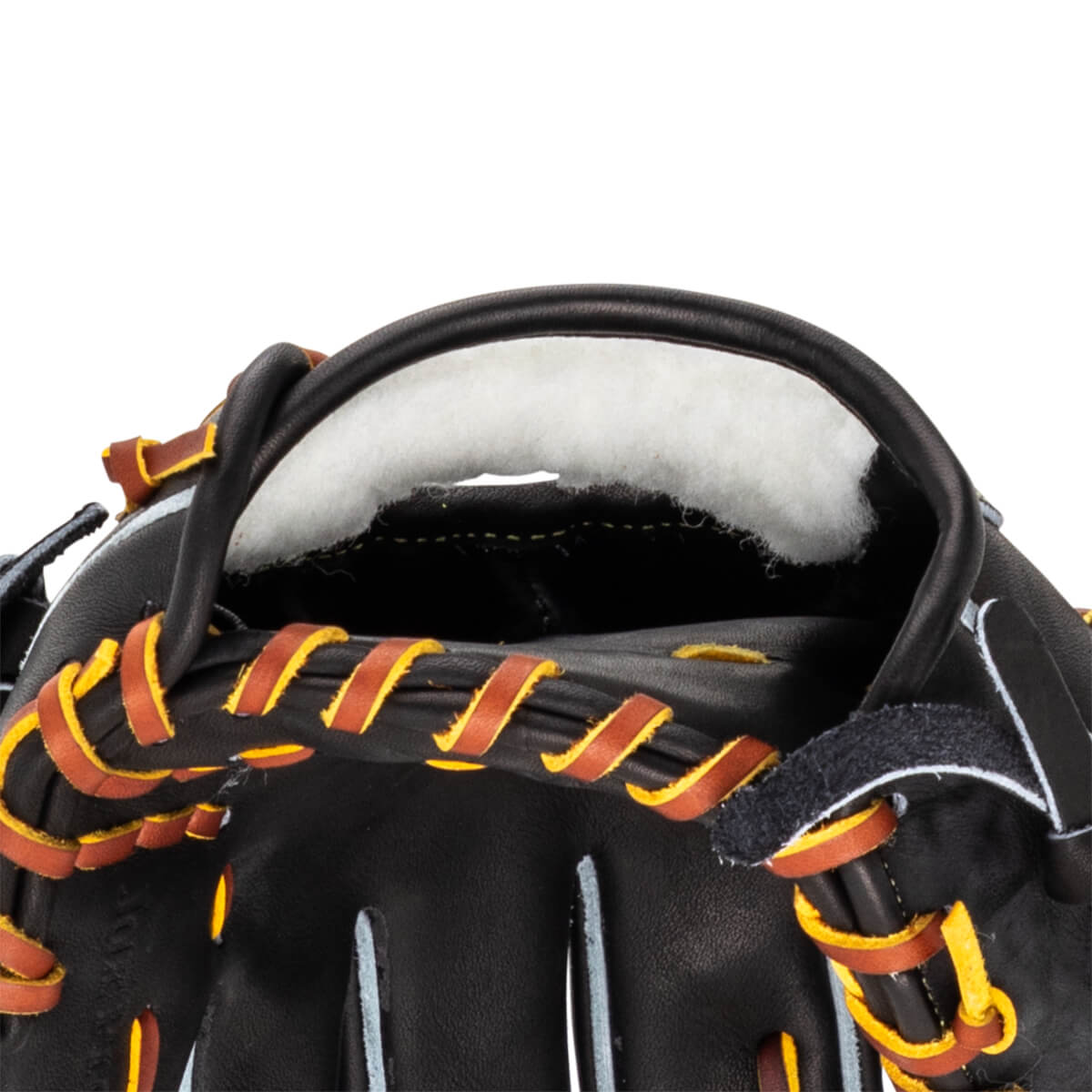 Close-up of the inside of a black baseball glove, showing white padding and brown and yellow lacing.