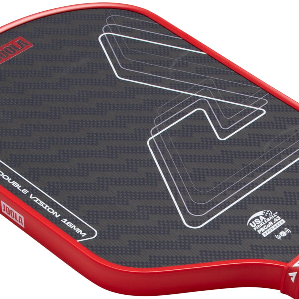 Angled close-up of a dark gray patterned pickleball paddle with a red edge, white abstract graphics, and DOUBLE VISION 16MM text.
