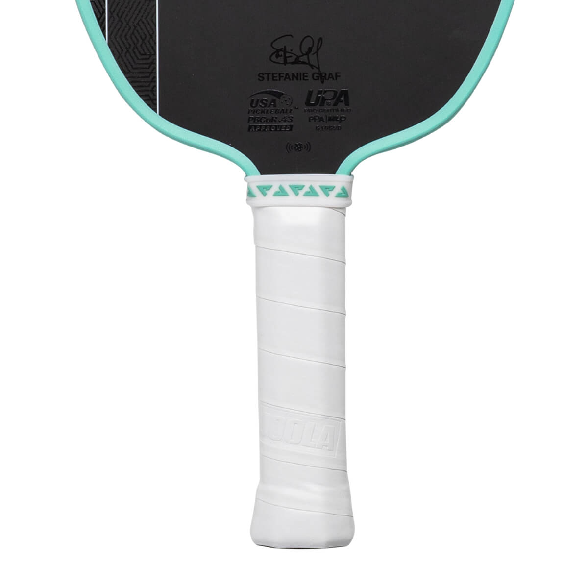 Close-up of a black pickleball paddle with a white wrapped grip, teal edge, and STEFANIE GRAF signature.