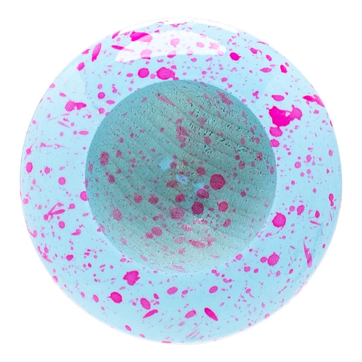 Top-down view of a light blue baseball bat end with vibrant pink paint splatters and a natural wood center.