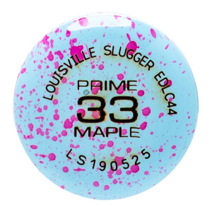 Top-down view of a light blue baseball bat end cap with pink speckles, featuring LOUISVILLE SLUGGER EDLC44 and PRIME 33 MAPLE.