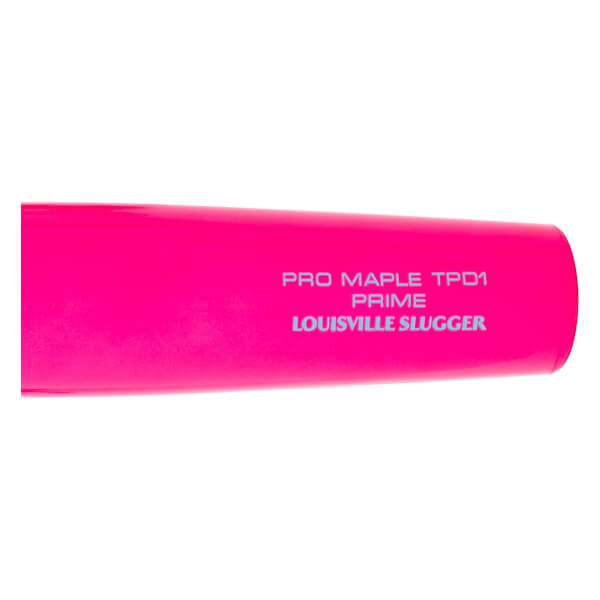 Close-up of a bright pink baseball bat with PRO MAPLE TPD1 PRIME and LOUISVILLE SLUGGER printed in gray.